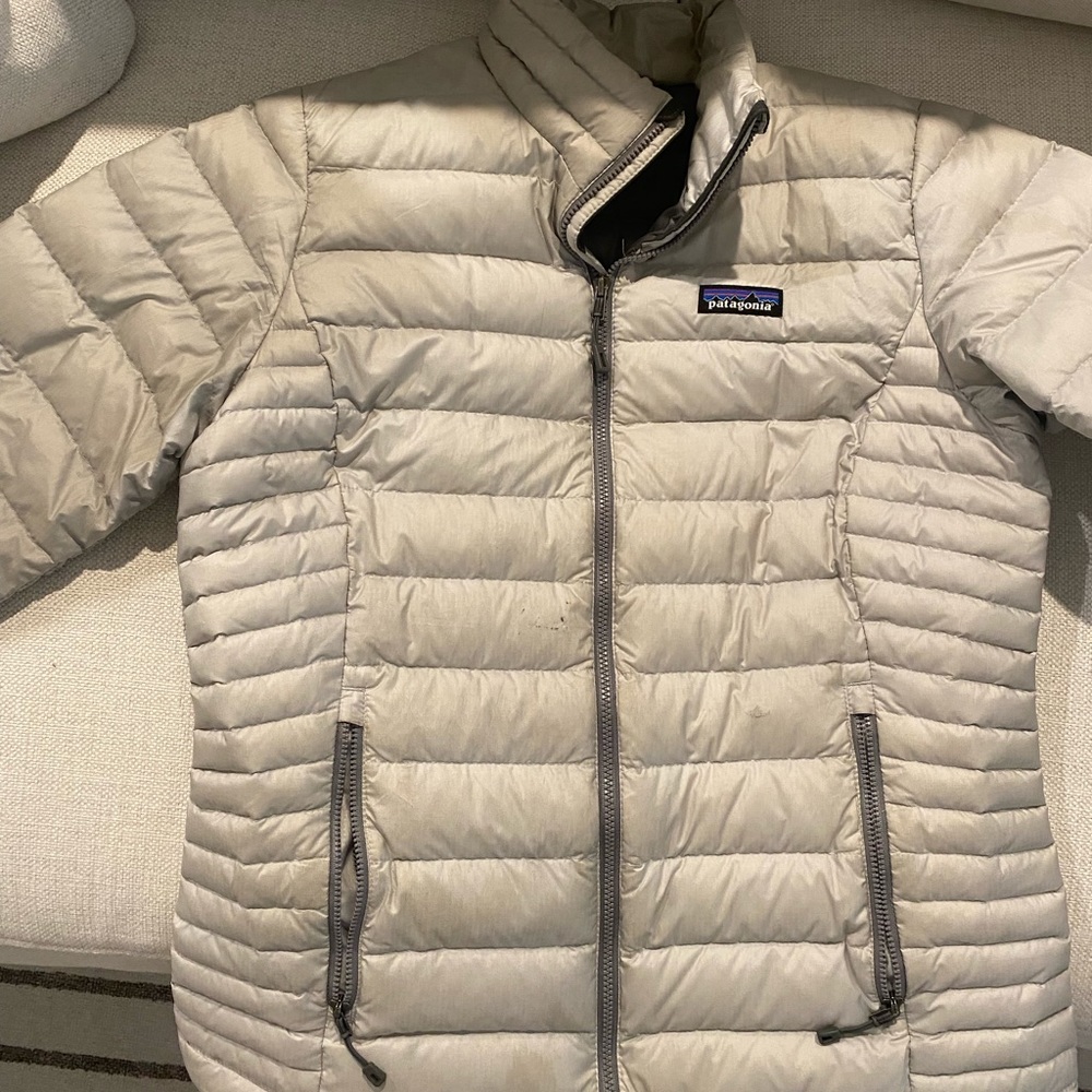 Patagonia Down Puffer Coat, light grey/silver color.
